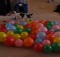 dog popping balloons